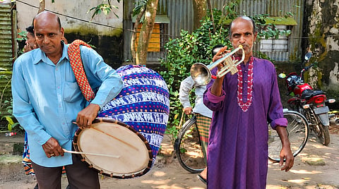 Gouranga Moni Das and his brother  Nritya Moni Das at Katiadi Dhak market 