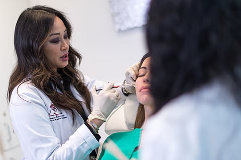 A patient receives a Sculptra injectable in Miami, Florida, US, December 2021.