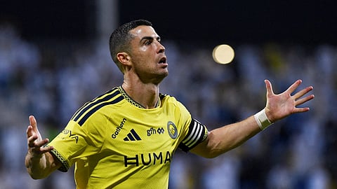 Al Nassr's Cristiano Ronaldo celebrates scoring their second goal.