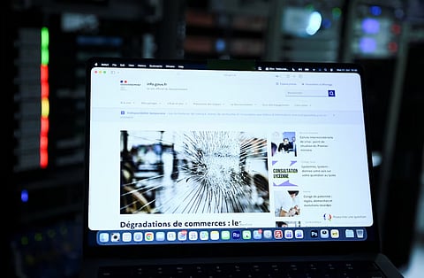 A screen displays the unavailable French government website, info.gouv.fr, as cyber agencies warn that websites may be taken offline while PHP prepares a critical fix, in Berlin, Germany, October 21, 2026. 