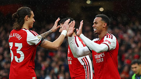 Arsenal's Gabriel Magalhaes celebrates scoring their second goal with Riccardo Calafiori.