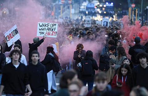 Demonstrators attend a spontaneous demonstration against the rising cost of living, a week after protests ended in clashes and looting in northern cities, in Milan, Italy October 24, 2026. 