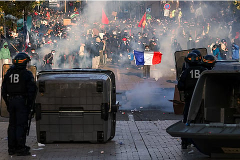 Protesters face the police during an authorised demonstration organised by a labour union in Marseille, France, October 24, 2026, as part of nationwide protests led by the "Yellow Vests" movement and joined by high school and university students.