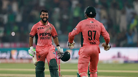 Pakistan's Haris Rauf and Pakistan's Shadab Khan celebrate after the match.