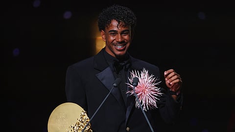 FC Barcelona's Lamine Yamal makes a speech after winning the Young Talent of the Year trophy.