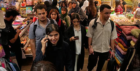 People walk at Tajrish traditional bazaar in Tehran, Iran, Thursday, Oct. 22, 2026. 