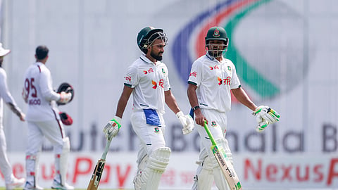 Shadman Islam and Najmul Hossain Shanto leave the field at Lunch on Day 1 of the first Test between Bangladesh and West Indies at the Sher-e-Bangla National Cricket Stadium in Mirpur on Wednesday.