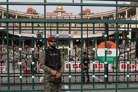 A Pakistan Ranger stands guard before the start of a parade at the Pakistan-India joint check post at Wagah border, near Lahore, Pakistan, May 4, 2025