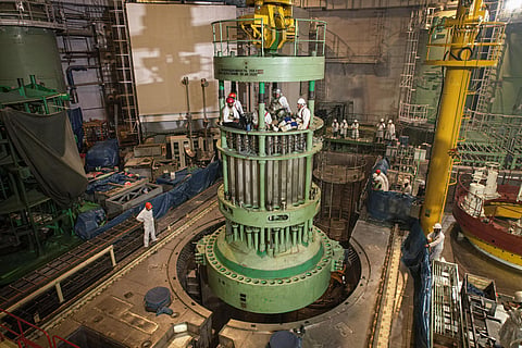 Technicians work on a reactor assembly. The Russian nuclear corporation has begun supplying fuel for Unit 2 of Bangladesh’s Rooppur Nuclear Power Plant while completing fuel deliveries for Unit 1’s first refueling cycle