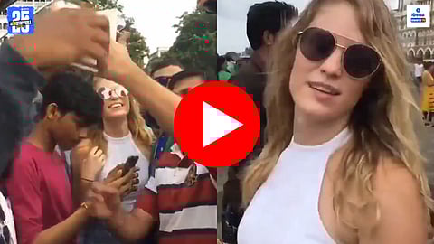 youth misbehaves with foreign woman