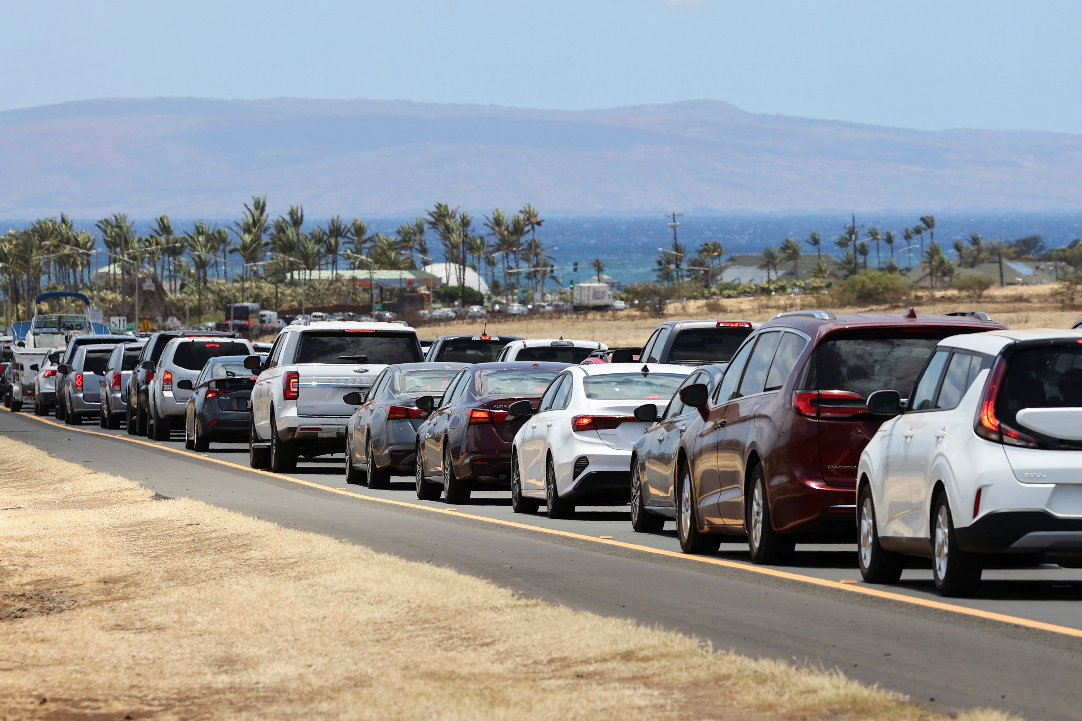Vehicles are seen in traffic on Honoapiilani Hwy after officials allowed residents and tourists back into West Maui after a wildfire destroyed the historic town of Lahaina, in Maui, Hawaii, U.S. August 11, 2023.