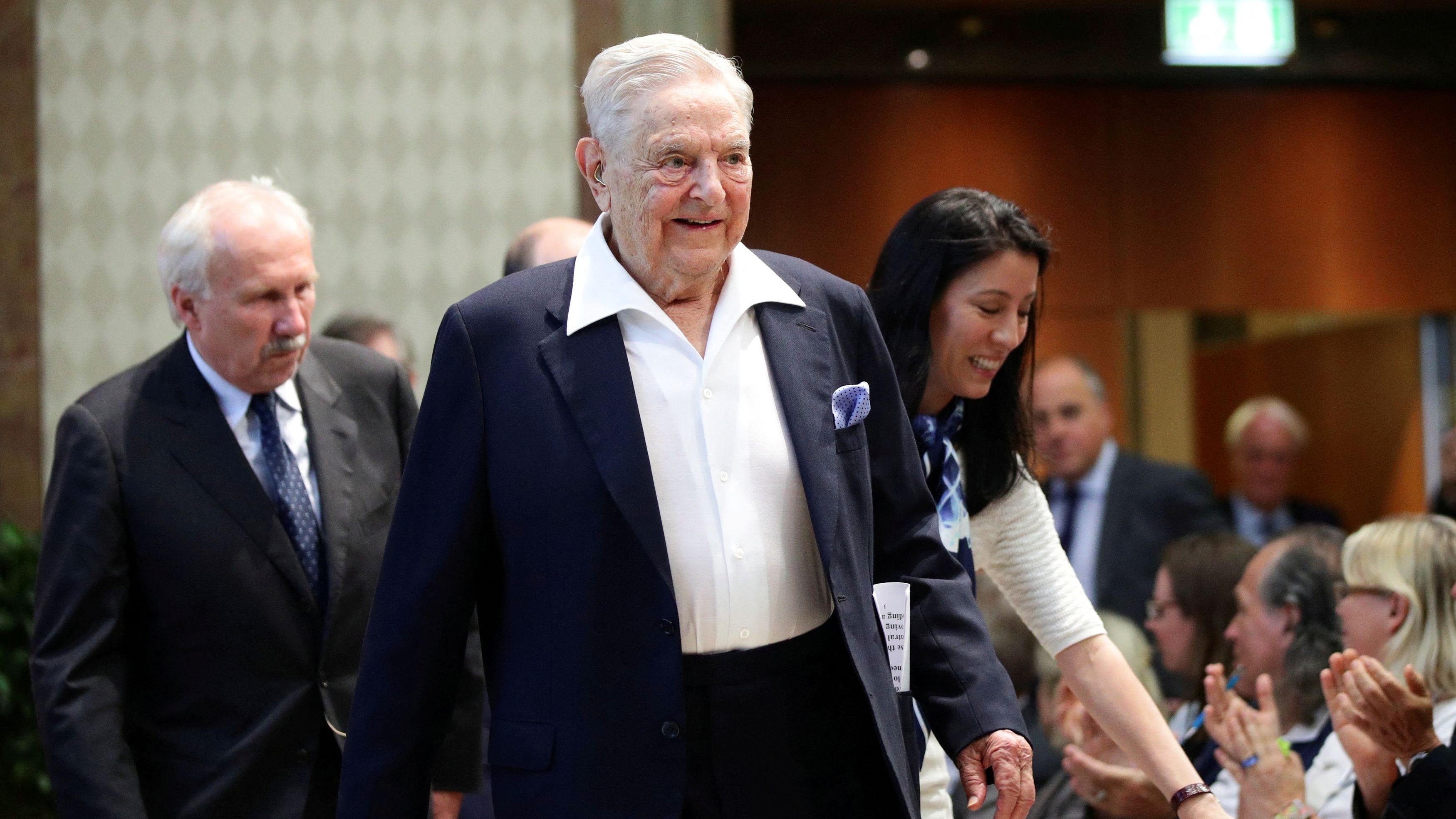 Trump says Soros and his son should be charged with RICO