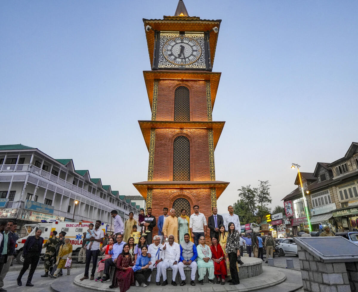 Rajya Sabha MP Eranna Kadadi, Lok Sabha MP Shyam Singh Yadav and BJP leader Dharmendra Kashap during their visit, at Clock Tower, Lal Chowk, in Srinagar.