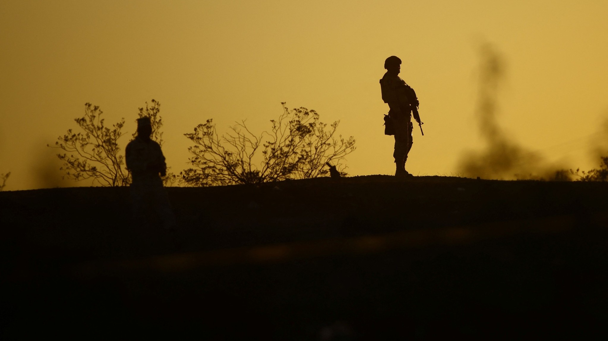 Members of the Mexican army stand guard at the scene where several bodies were found in a clandestine grave on a vacant lot, according to local media, in Ciudad Juarez, Mexico September 6, 2023. 