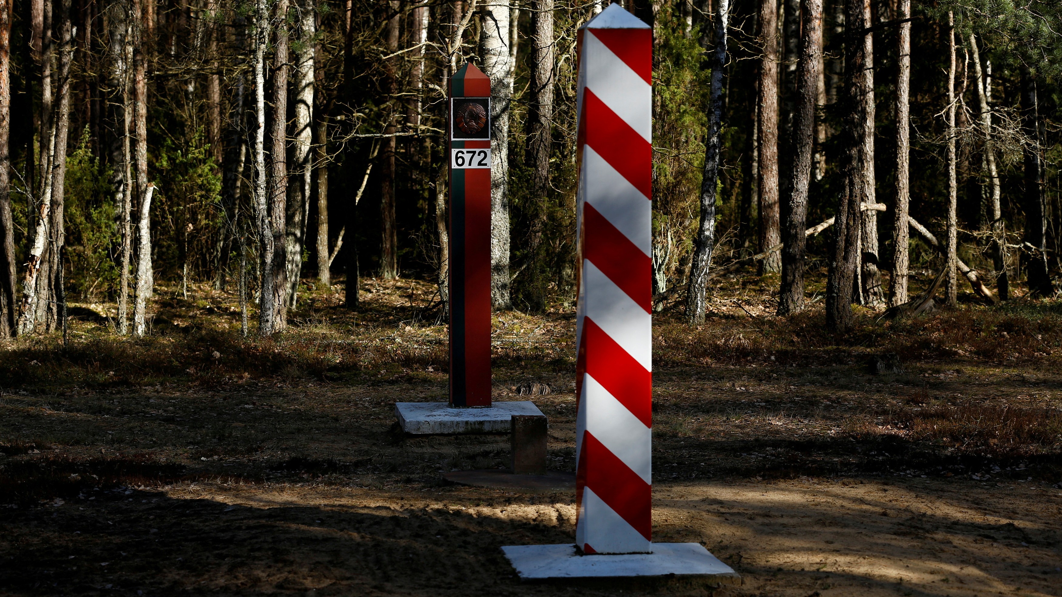 Border signs are pictured at the Polish-Belarusian border near Stanowisko village. 