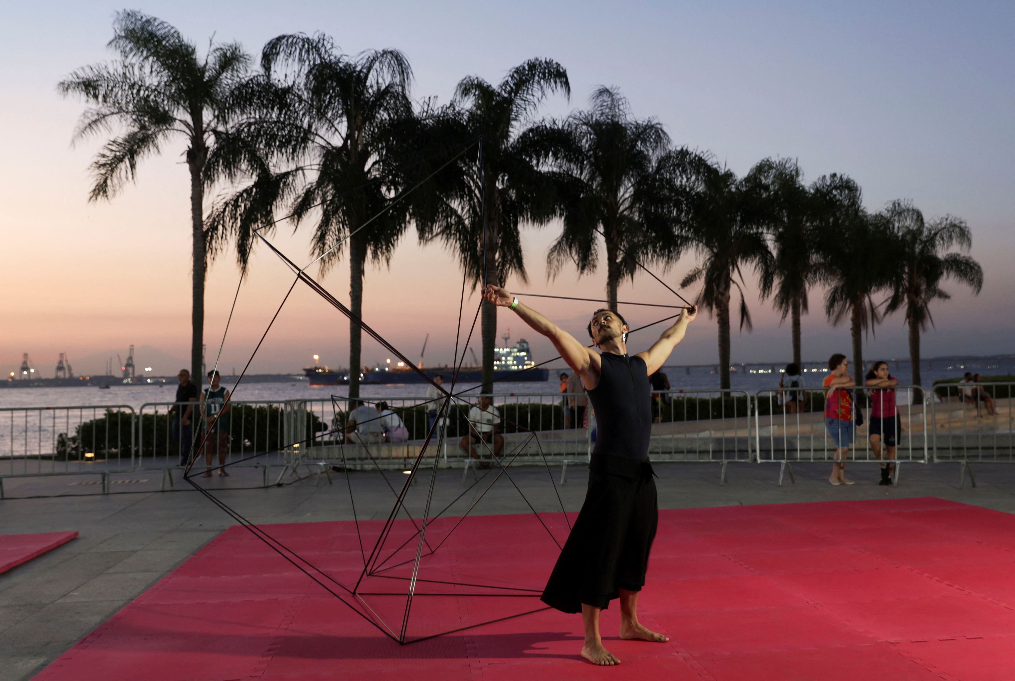 A dancer performs at an installation by Brazilian artist Ludmila Rodrigues during the opening of the NOVA - Biennial of Art and Technology in Museu do Amanha in Rio de Janeiro, Brazil, September 19, 2023.