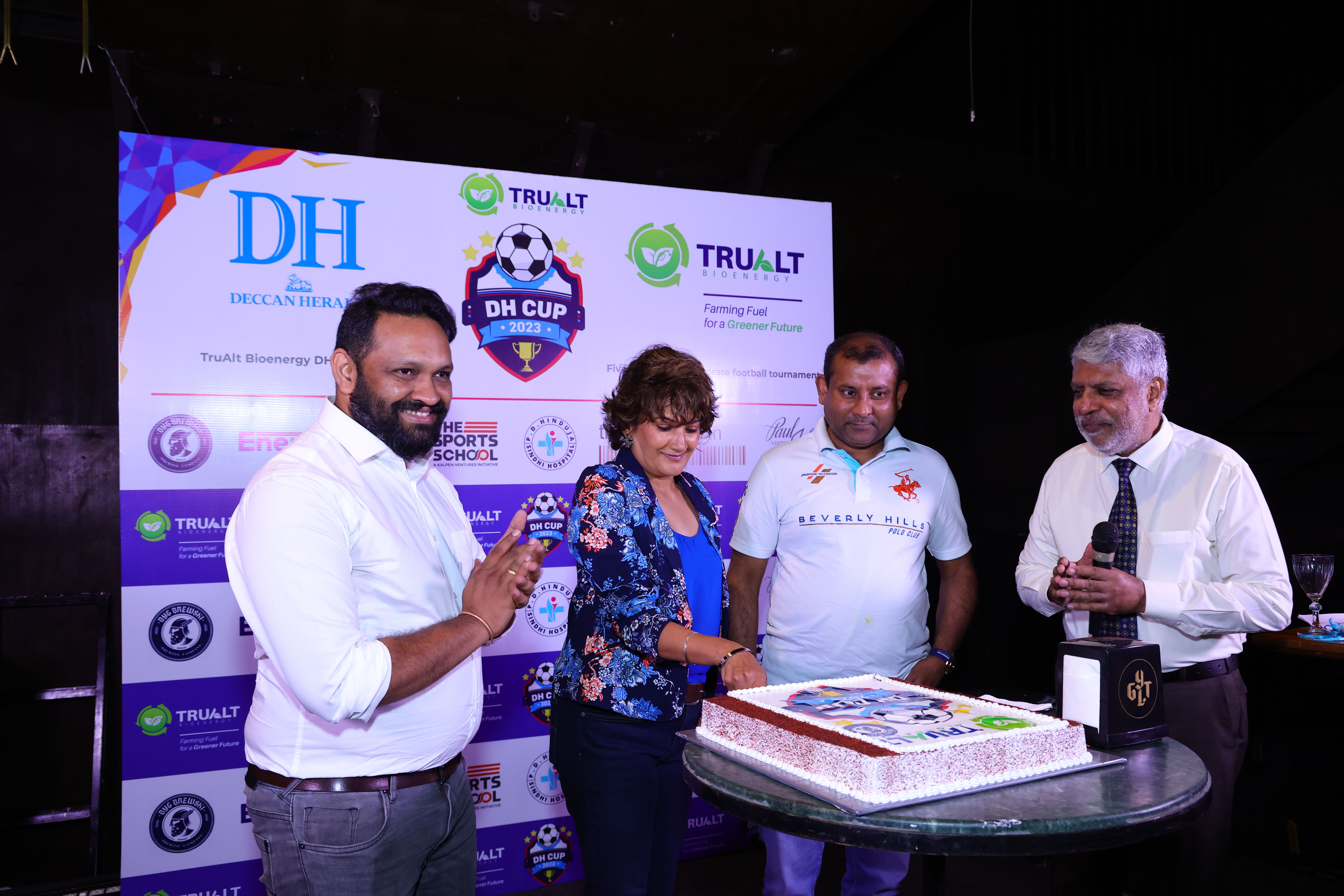 (Left to right) Launch event hosts Ravi Meka and Sumeet Brahmawar Byg Brewski; and sponsor DH Cup 2023 Debnath Mukhopadhyay TruAlt Bioenergy Ltd cut a cake to set the ball rolling.