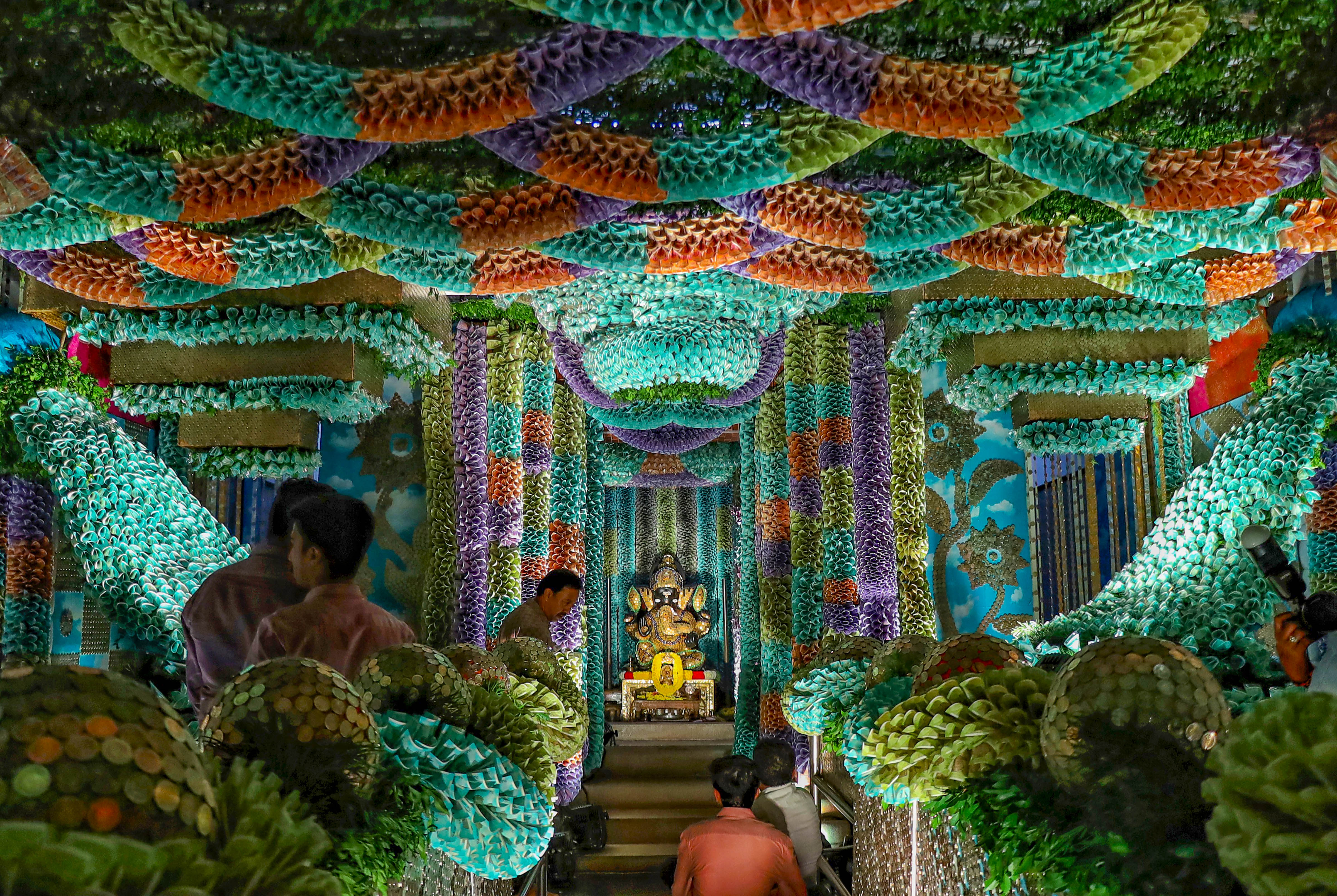 Sri Sathya Sai Ganapathy temple decorated with fifty lakhs coins and more than one crore currency notes on the occasion of Ganesha Chaturthi festival at J.P. Nagar, in Bengaluru, Monday, Sept. 18, 2023.