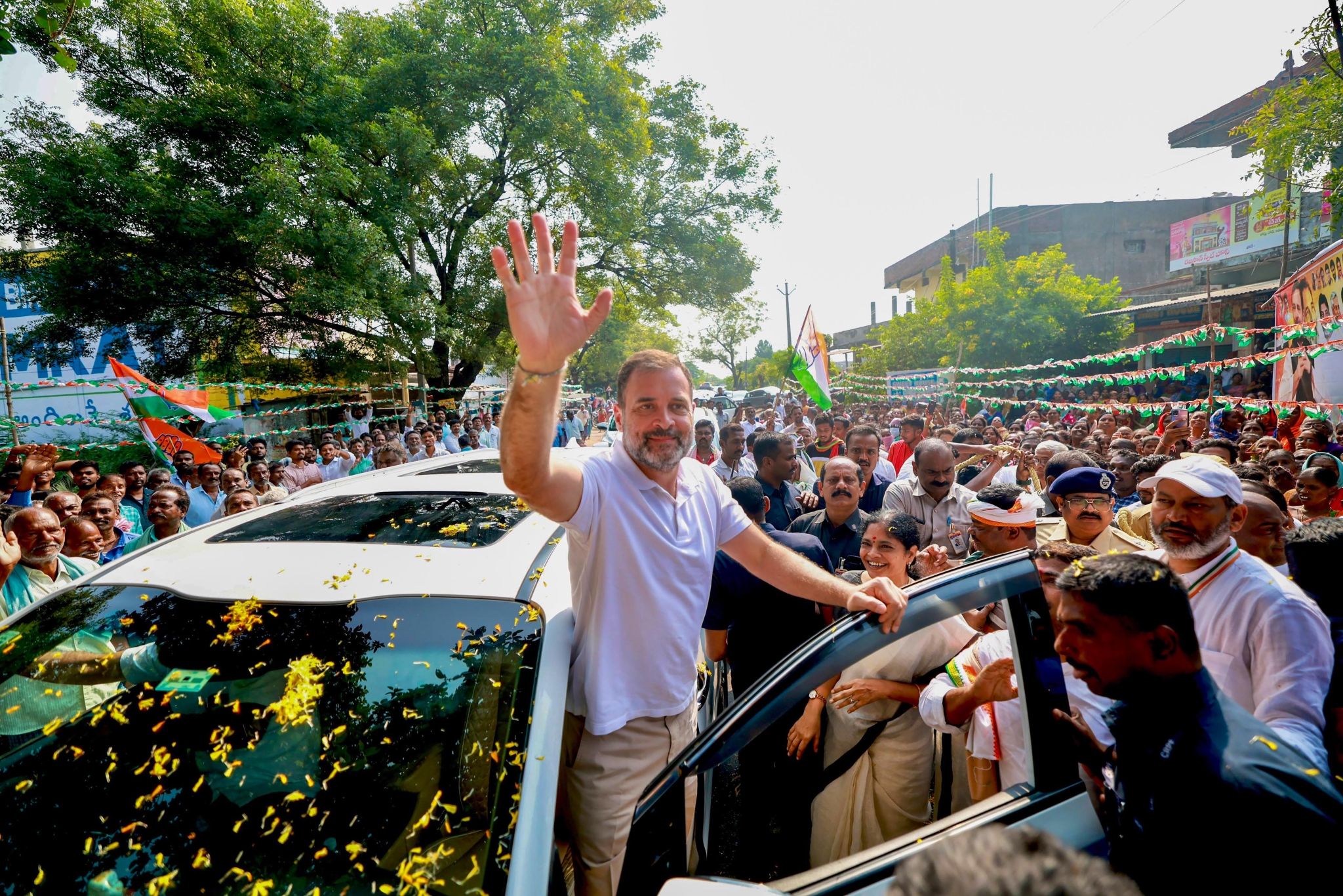 Congress leader Rahul Gandhi waves at supporters during his visit to Telangana ahead of the State Assembly elections, in Jagtial district on Friday, Oct 20.
