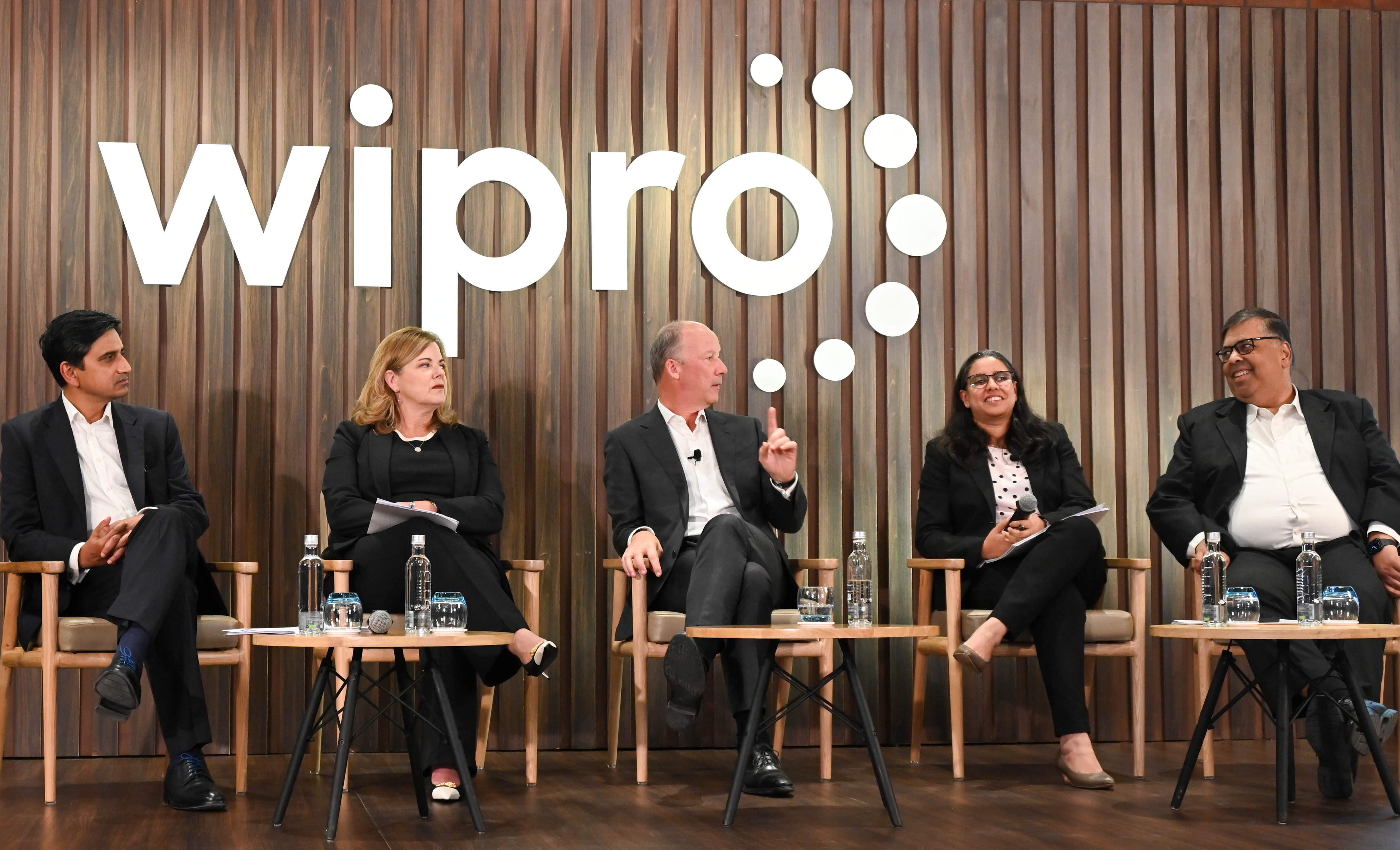 (From Left) Amit Choudhary Chief Operating Officer Stephanie Trautman Chief Growth Officer Thierry Delaporte Chief Executive Officer & Managing Director Aparna Iyer Chief Financial Officer and Saurabh Govil Chief Human Resources Officer of Wipro Limited. are seen during a press conference to announce the Q2FY24 financial results at Wipro Limited in Bengaluru on Wednesday. DH Photo/ B H Shivakumar