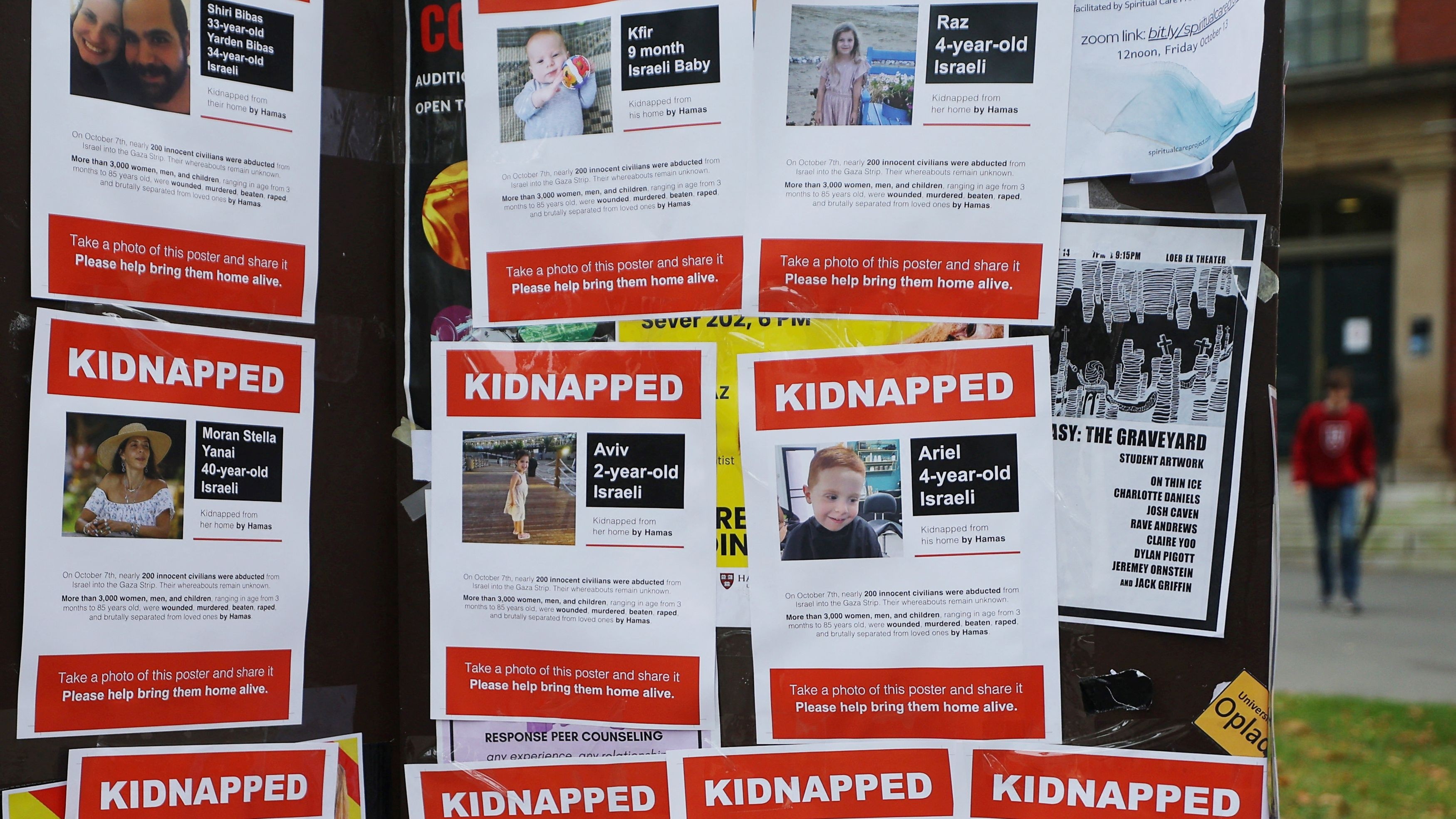 Flyers reading "Kidnapped" and showing Israelis taken hostage are posted on a public notice board, amid the ongoing conflict between Israel and Hamas, at Harvard University in Cambridge, Massachusetts, U.S.