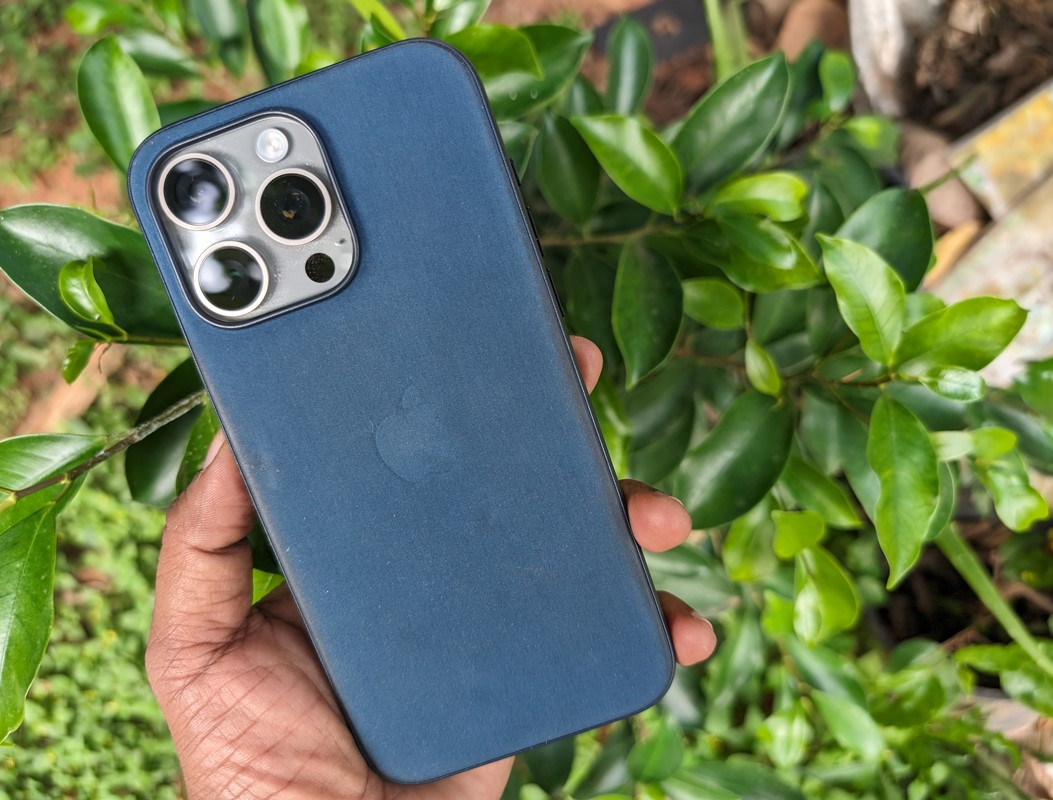 Apple iPhone 15 Pro Max with FineWoven case.