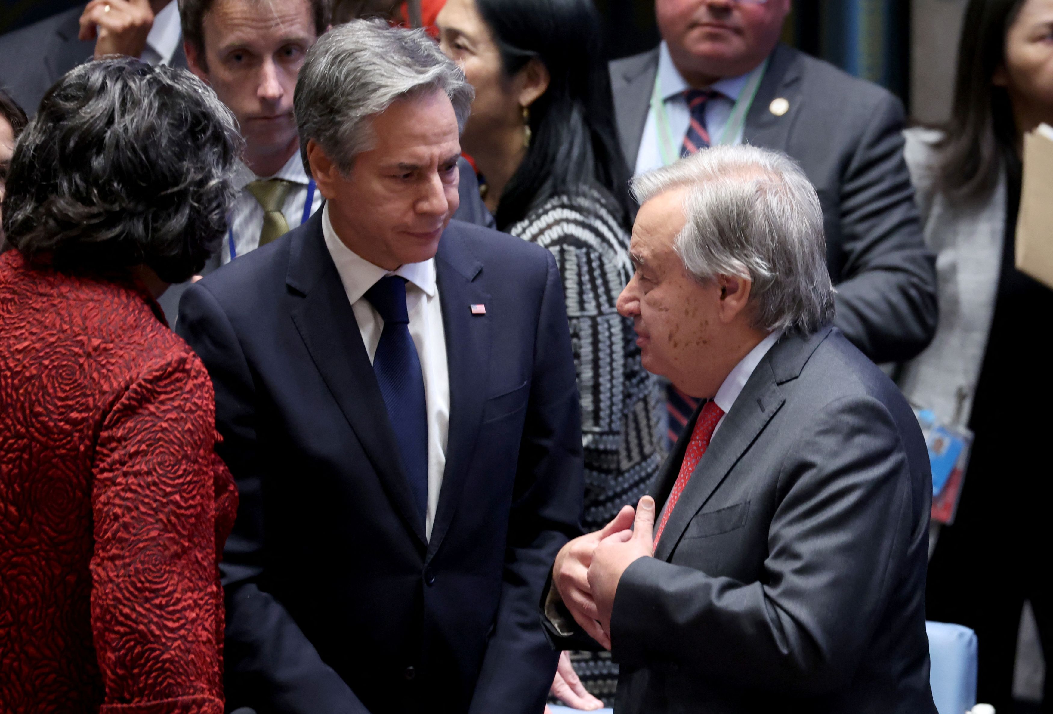 US Secretary of State Antony Blinken speaks with United Nations Secretary-General Antonio Guterres ahead of a meeting on the conflict between Israel and the Palestinian Islamist group Hamas at UN headquarters in New York, October 24, 2023. 