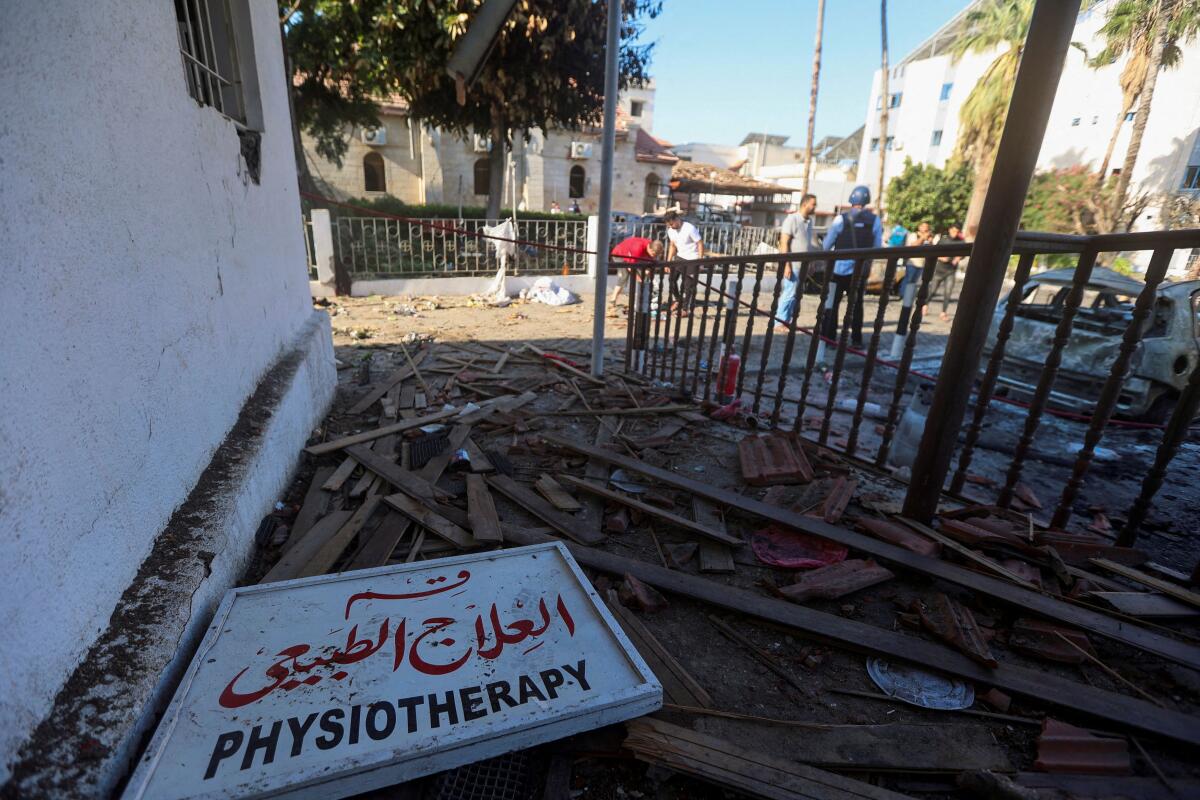 A view of debris in the area of Al-Ahli hospital where hundreds of Palestinians were killed in a blast that Israeli and Palestinian officials blamed on each other, and where Palestinians who fled their homes were sheltering amid the ongoing conflict with Israel, in Gaza City, October 18, 2023.