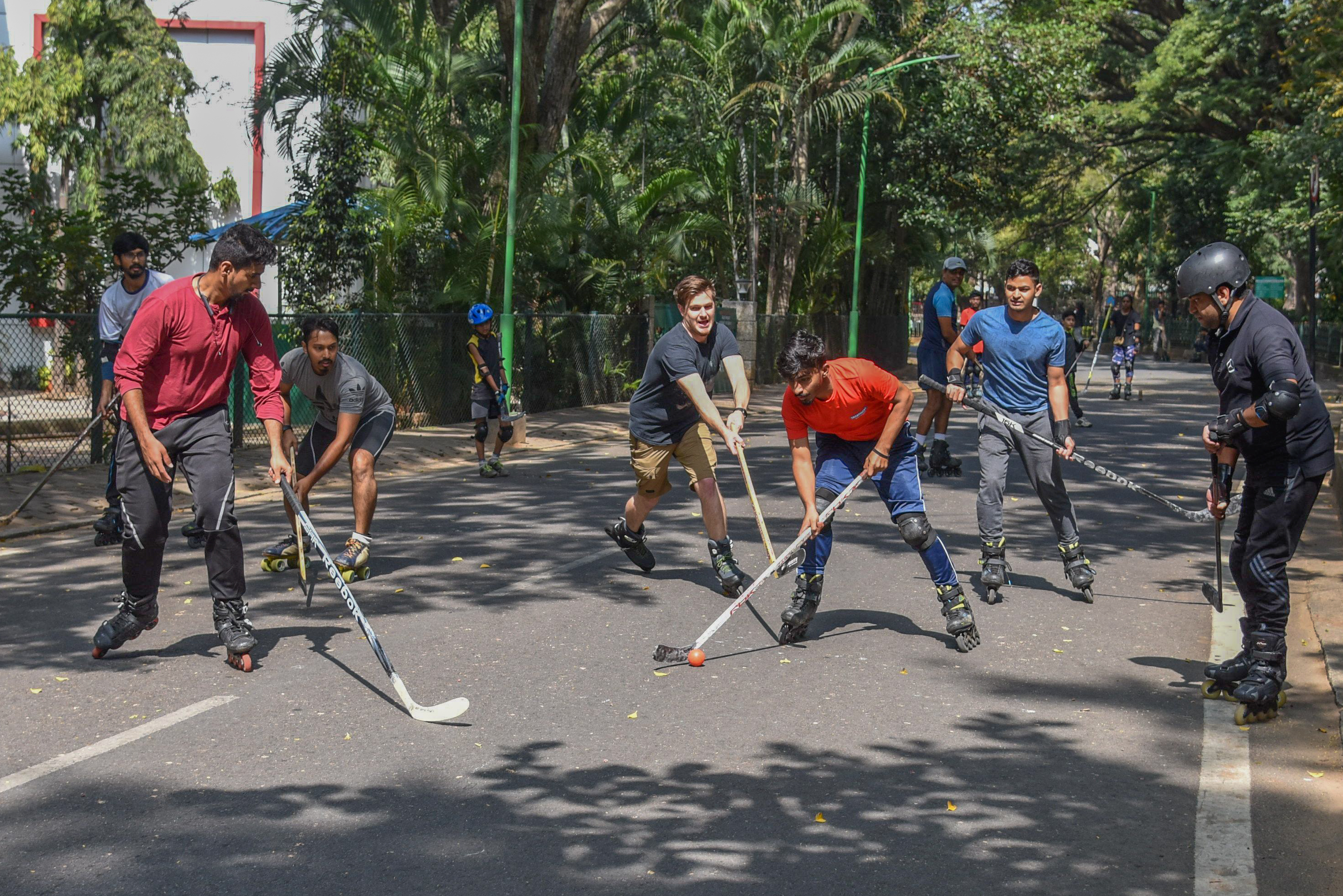Skaters play hockey at Cubbon Park. 