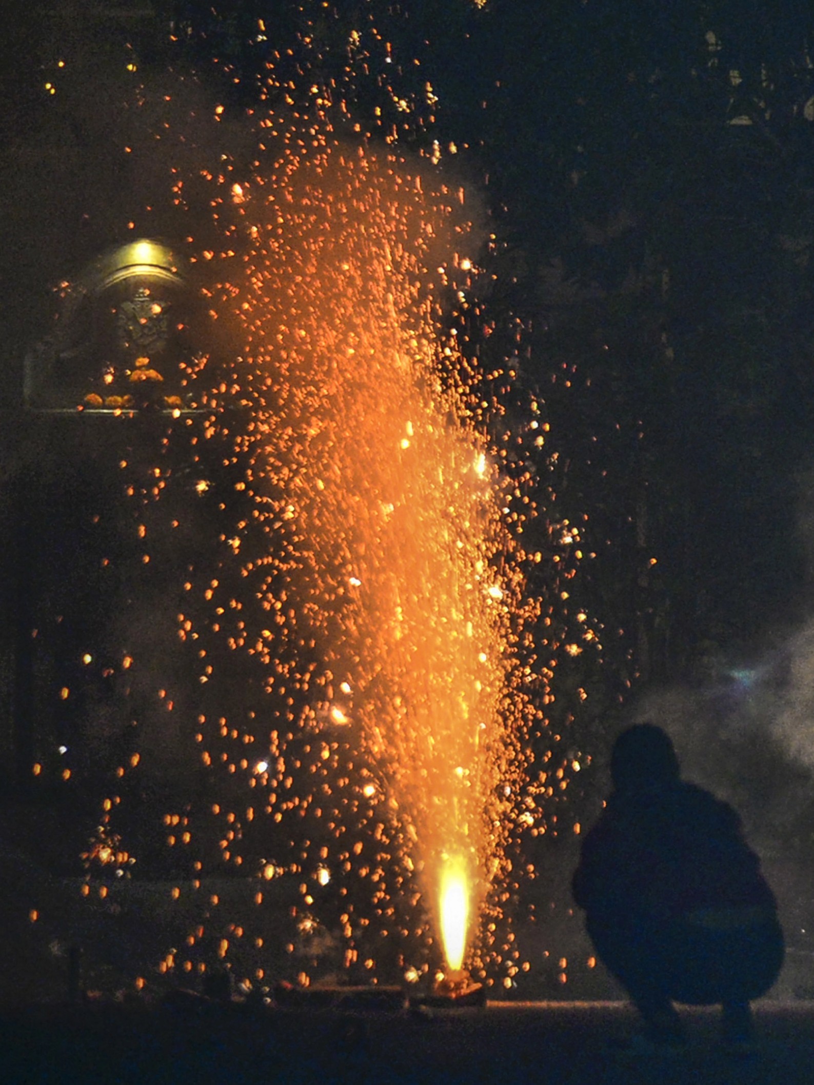 People burst firecrackers during Diwali celebrations, in Jalandhar.