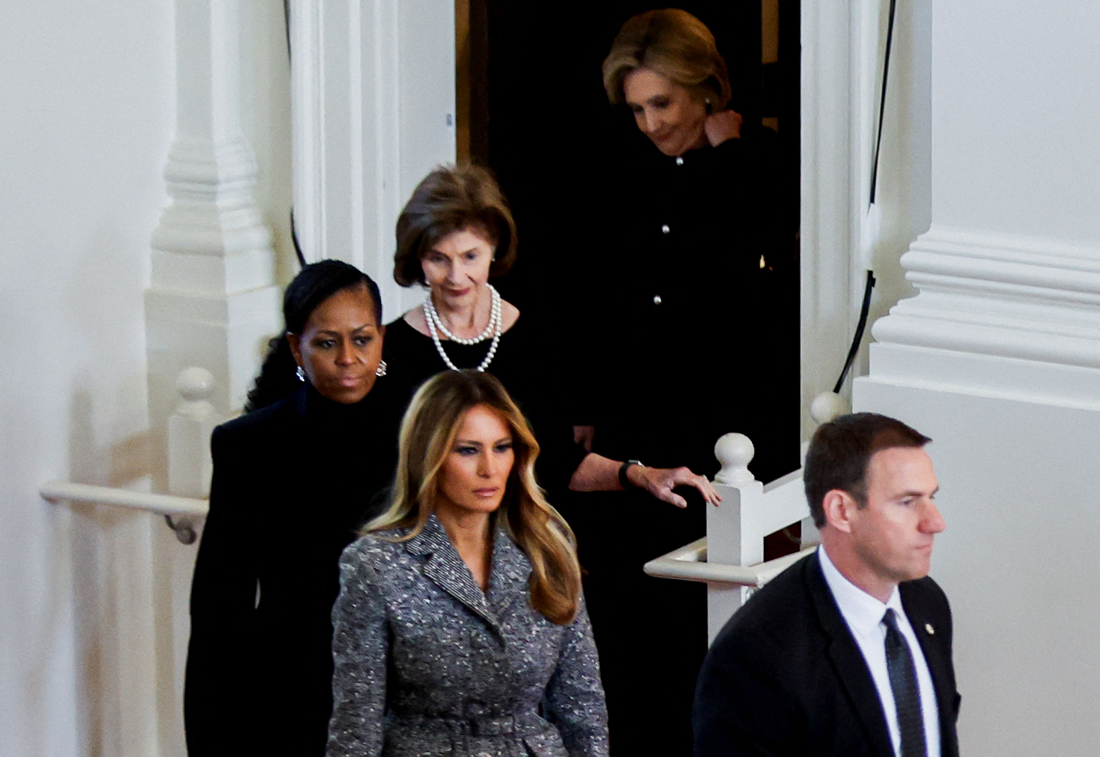 Former U.S. first ladies Michelle Obama, Melania Trump, Laura Bush and Hillary Clinton attend a tribute service for former first lady Rosalynn Carter at Glenn Memorial Church in Atlanta, Georgia, U.S., November 28, 2023. 