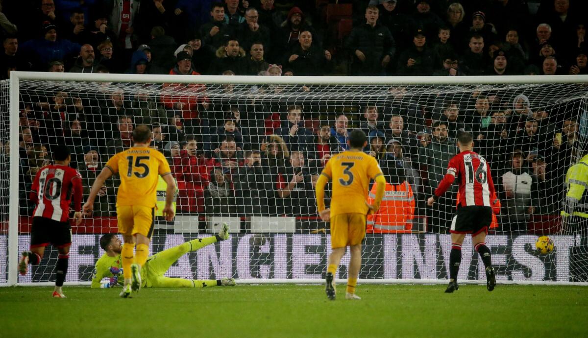Oliver Norwood scores a second against Wolves.