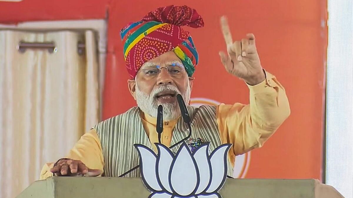 Prime Minister Narendra Modi speaks during a public meeting ahead of Rajasthan Assembly elections, in Nagaur. 
