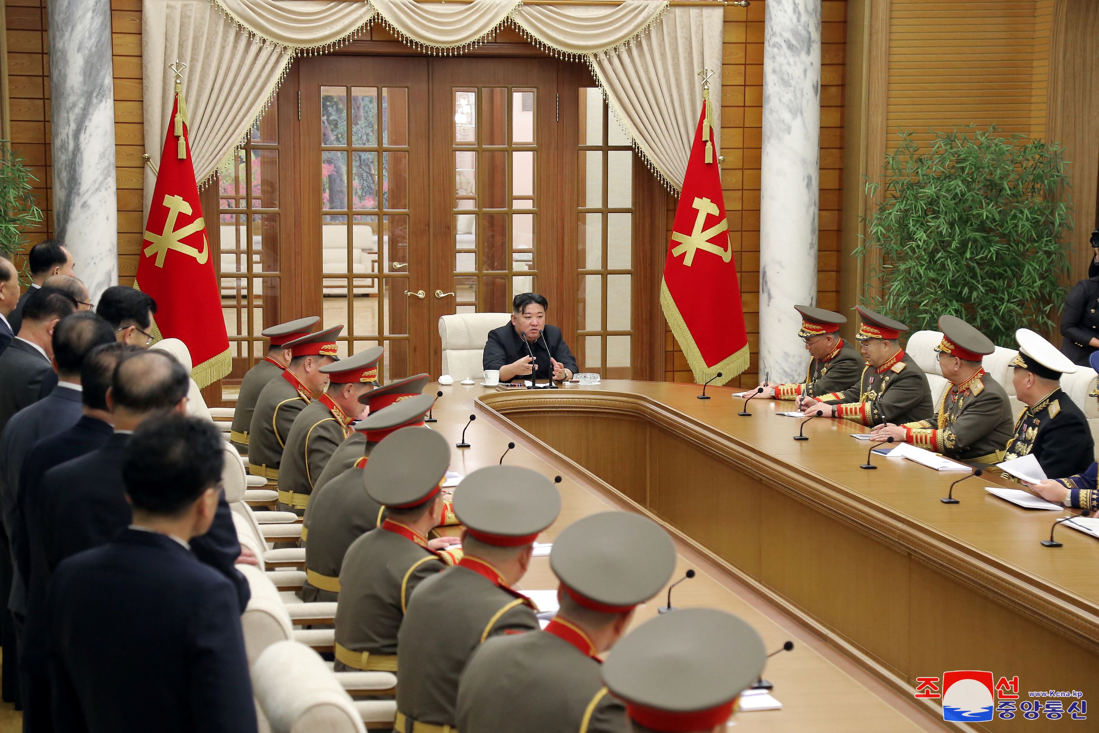 North Korean leader Kim Jong Un meets with commanders of the Korean People's Army, at the headquarters of the Central Committee of the Party, in Pyongyang, North Korea, in this picture released by the Korean Central News Agency on January 1, 2024. 
