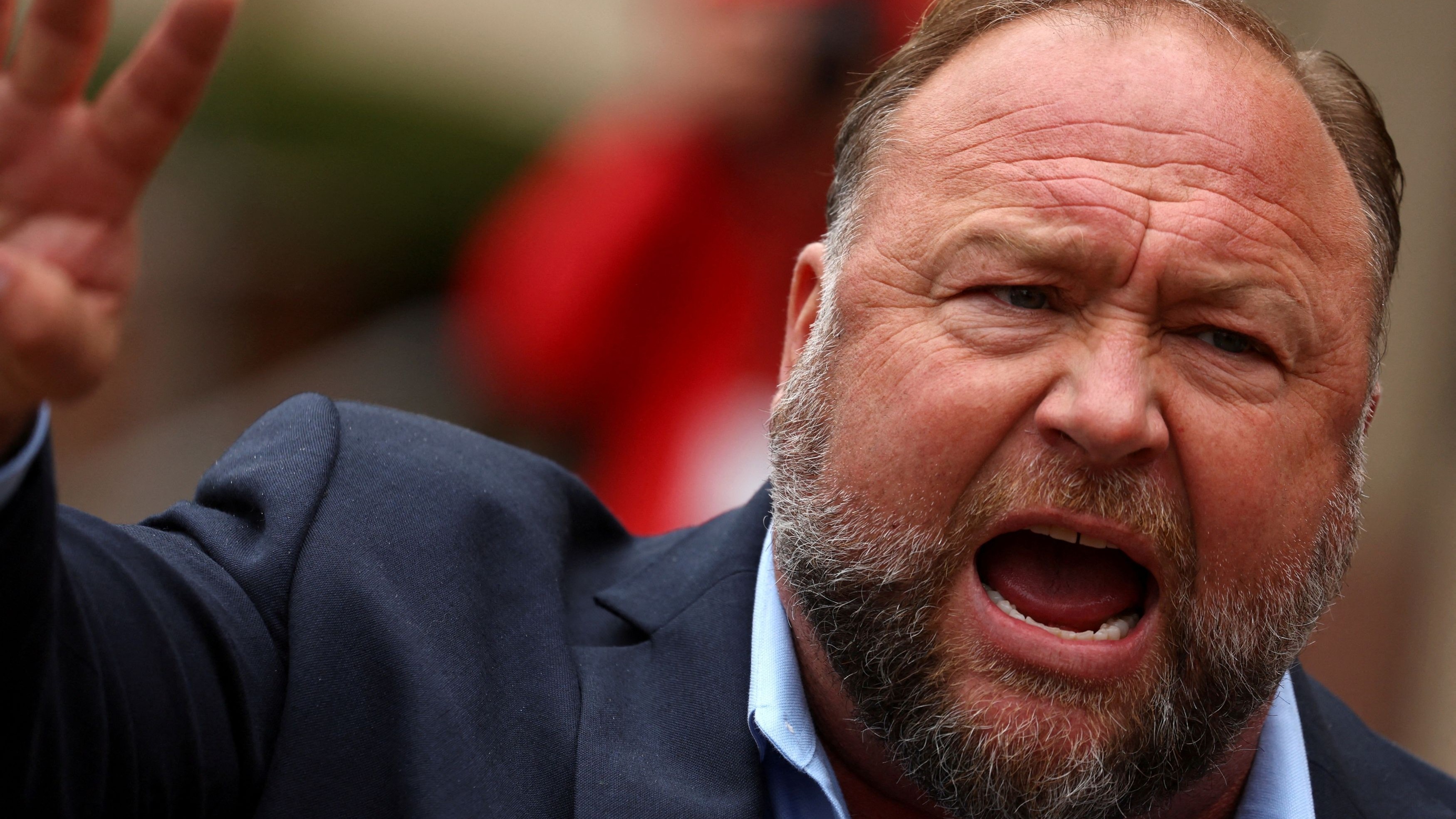 Conspiracy theorist Alex Jones account reinstated on X after poll