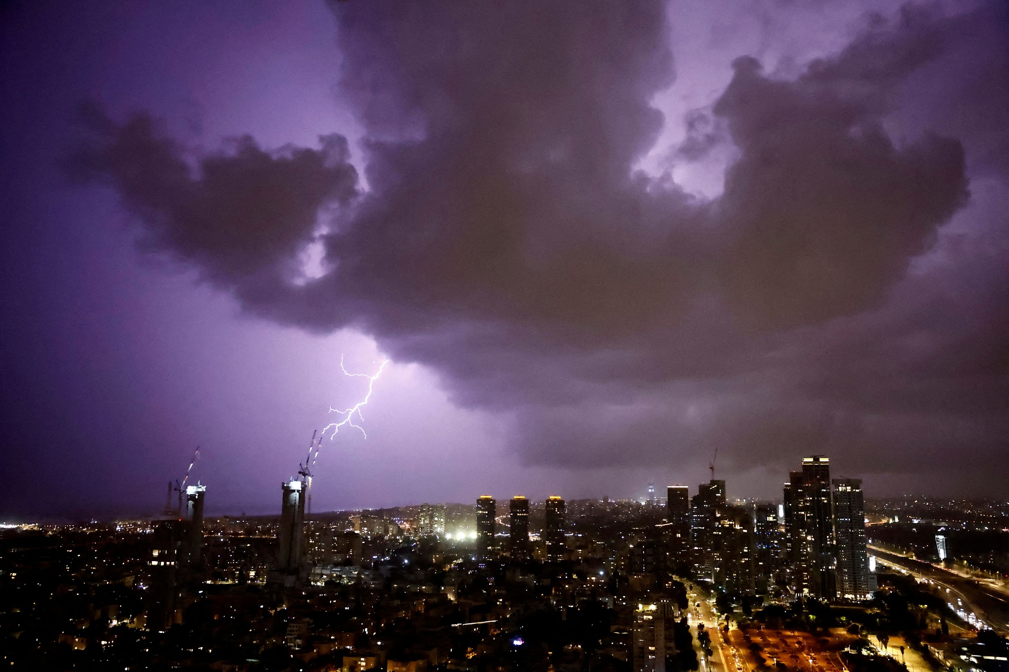 Lightning strikes over the sky in Tel Aviv, Israel, amid the ongoing conflict between Israel and the Palestinian Islamist group Hamas, in Gaza Strip, December 22, 2023.