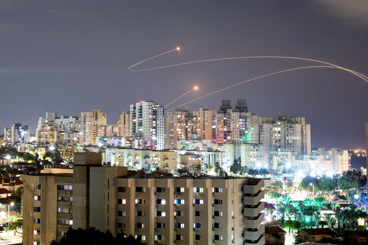 Israel's Iron Dome anti-missile system intercepts rockets launched from the Gaza Strip, amid the ongoing conflict between Israel and the Palestinian Islamist group Hamas, as seen from Ashkelon, Israel, December 24, 2023.