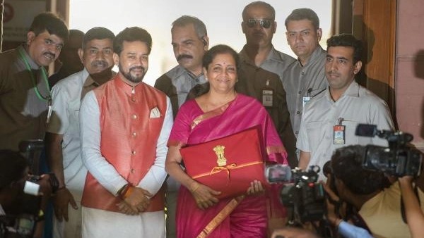Finance Minister Nirmala Sitharaman with MoS Anurag Thakur arrive at Parliament to present the Union Budget 2019-20.