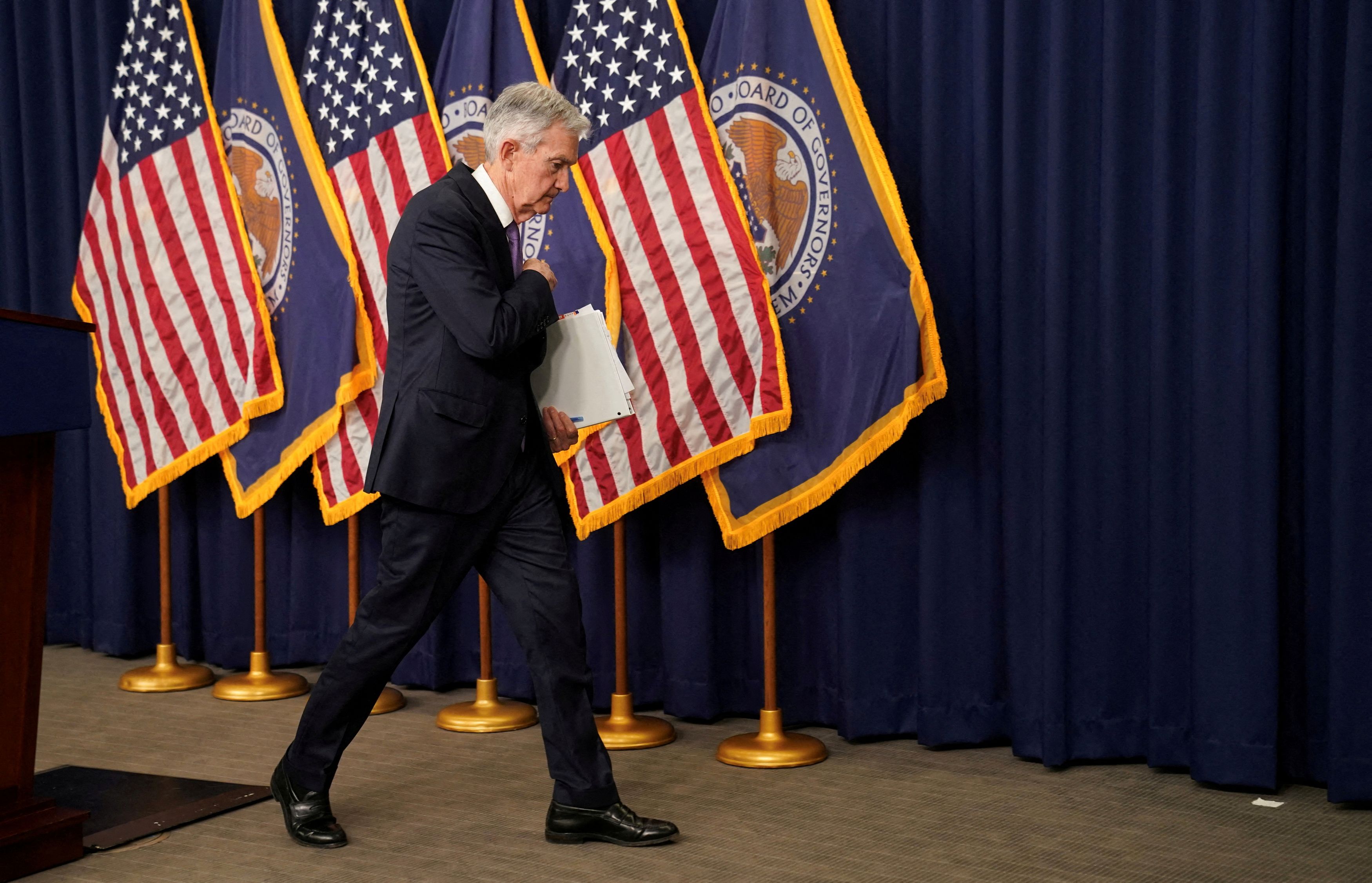 FILE PHOTO: Federal Reserve Board Chair Jerome Powell departs a press conference at the Federal Reserve in Washington U.S. December 13 2023. REUTERS/File Photo