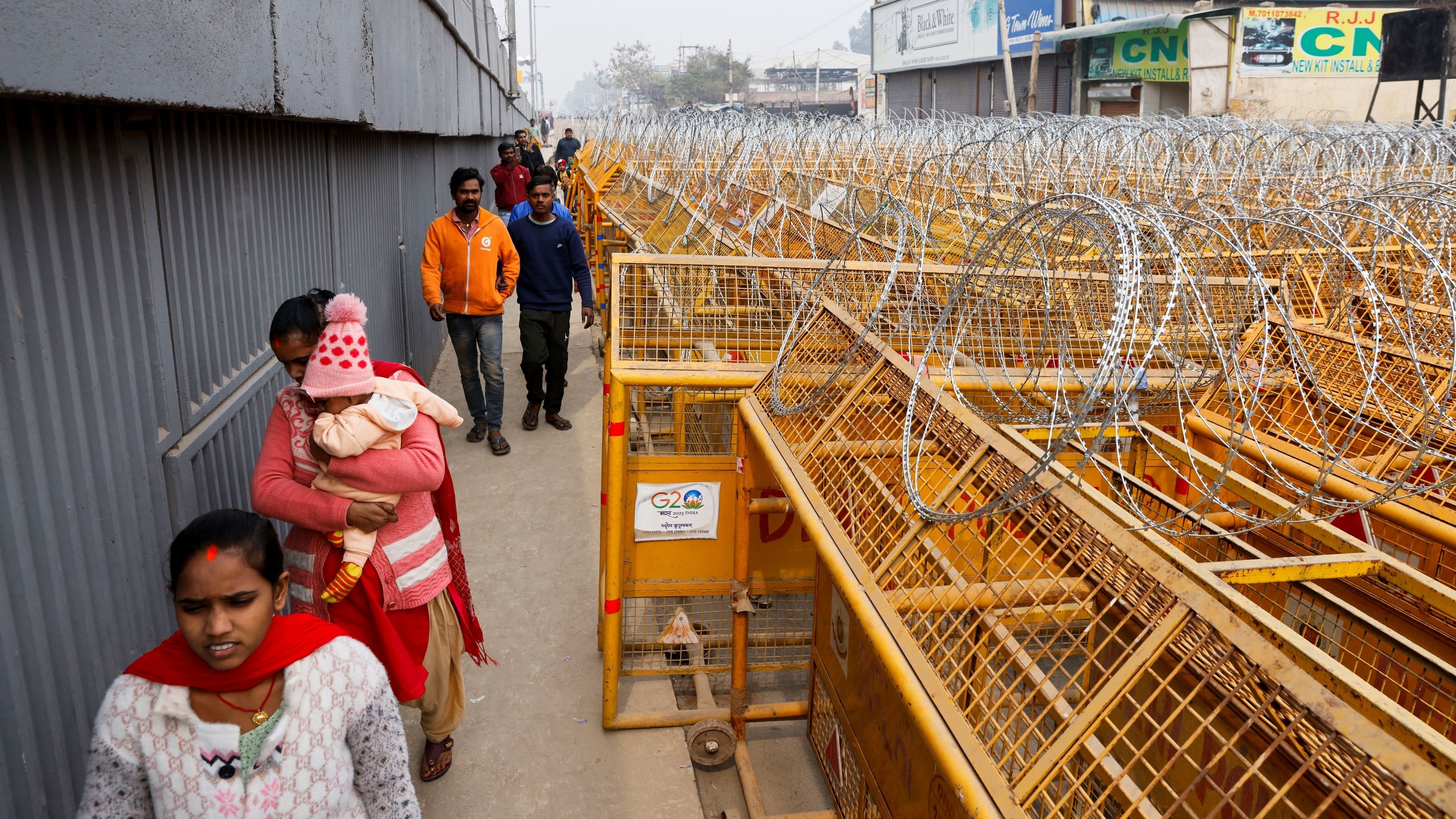 People cross Delhi-Haryana border on foot as police stop vehicles in view of farmers' march