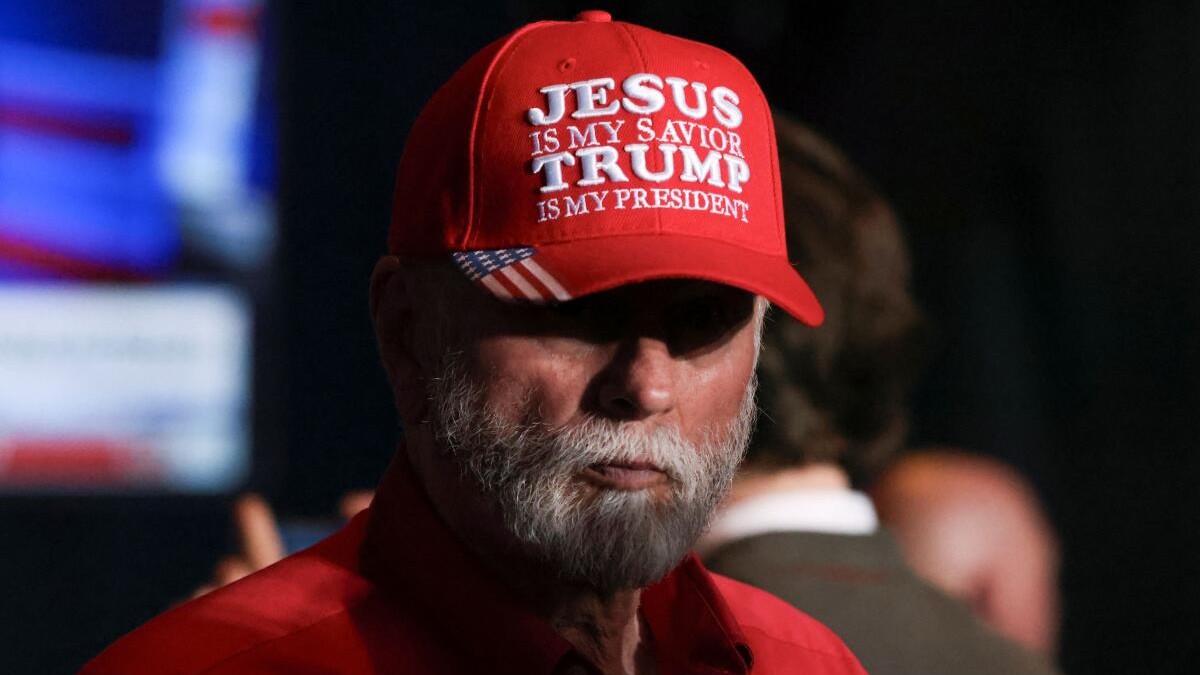 A supporter of Republican presidential candidate and former US President Donald Trump attends his South Carolina Republican presidential primary election night party in Columbia, South Carolina.
