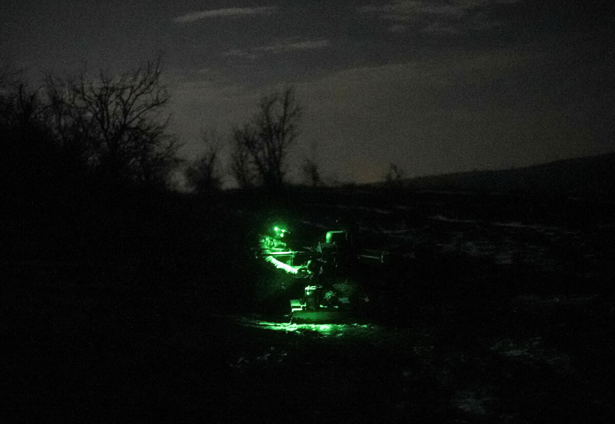 A Ukrainian serviceman of the attack drones battalion of the Achilles 92nd brigade, prepares a Vampire combat drone before flying over positions of Russian troops near the frontline town of Bakhmut, amid Russia's attack on Ukraine, in Donetsk region, Ukraine February 1, 2024.