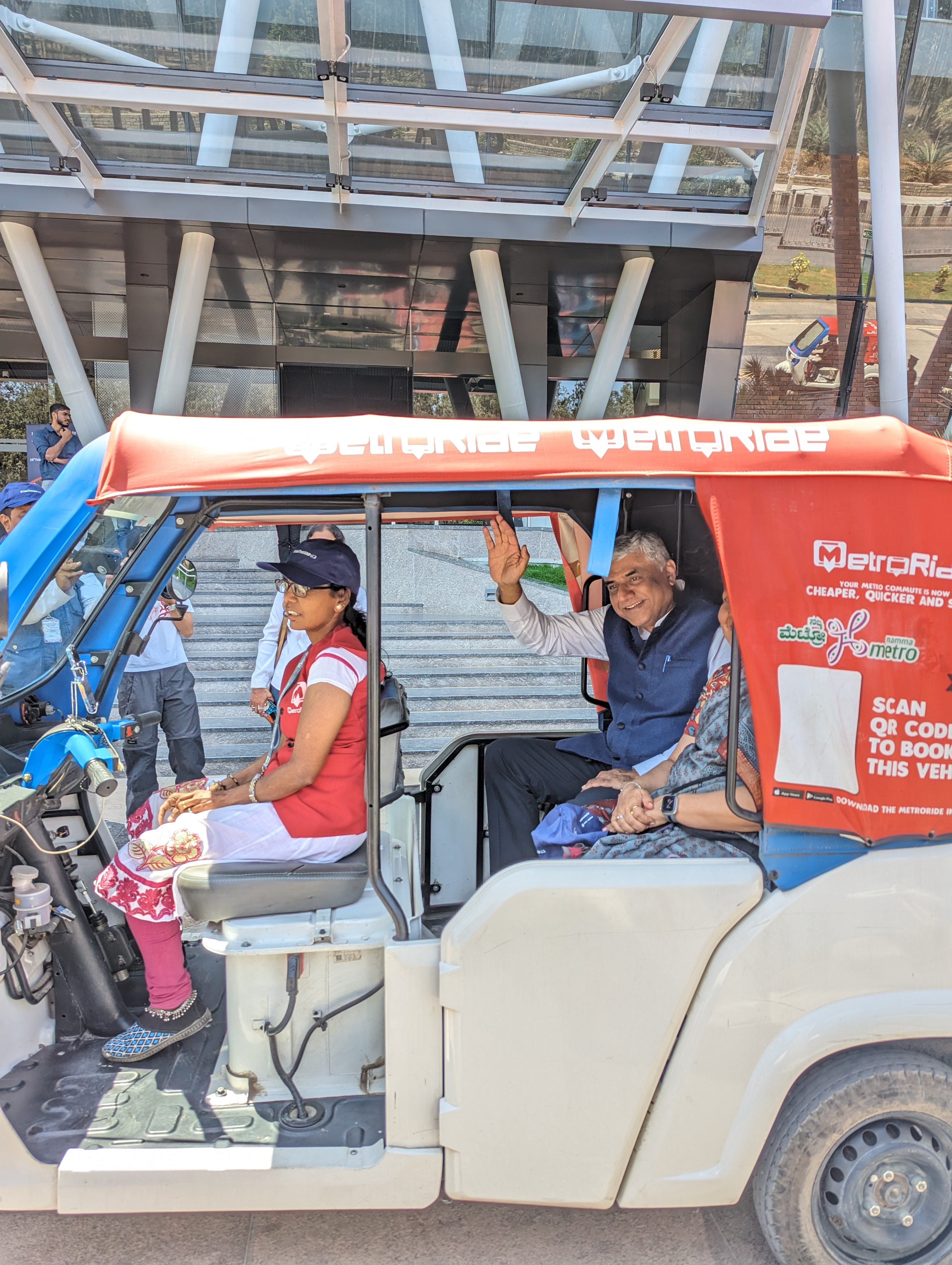 Prof Rajeev Gowda Vice Chairman State Institute for the Tranwsformation of Karnataka waves from an electric auto-rickshaws flagged off on Wednesday. Credit: Udbhavi Balakrishna