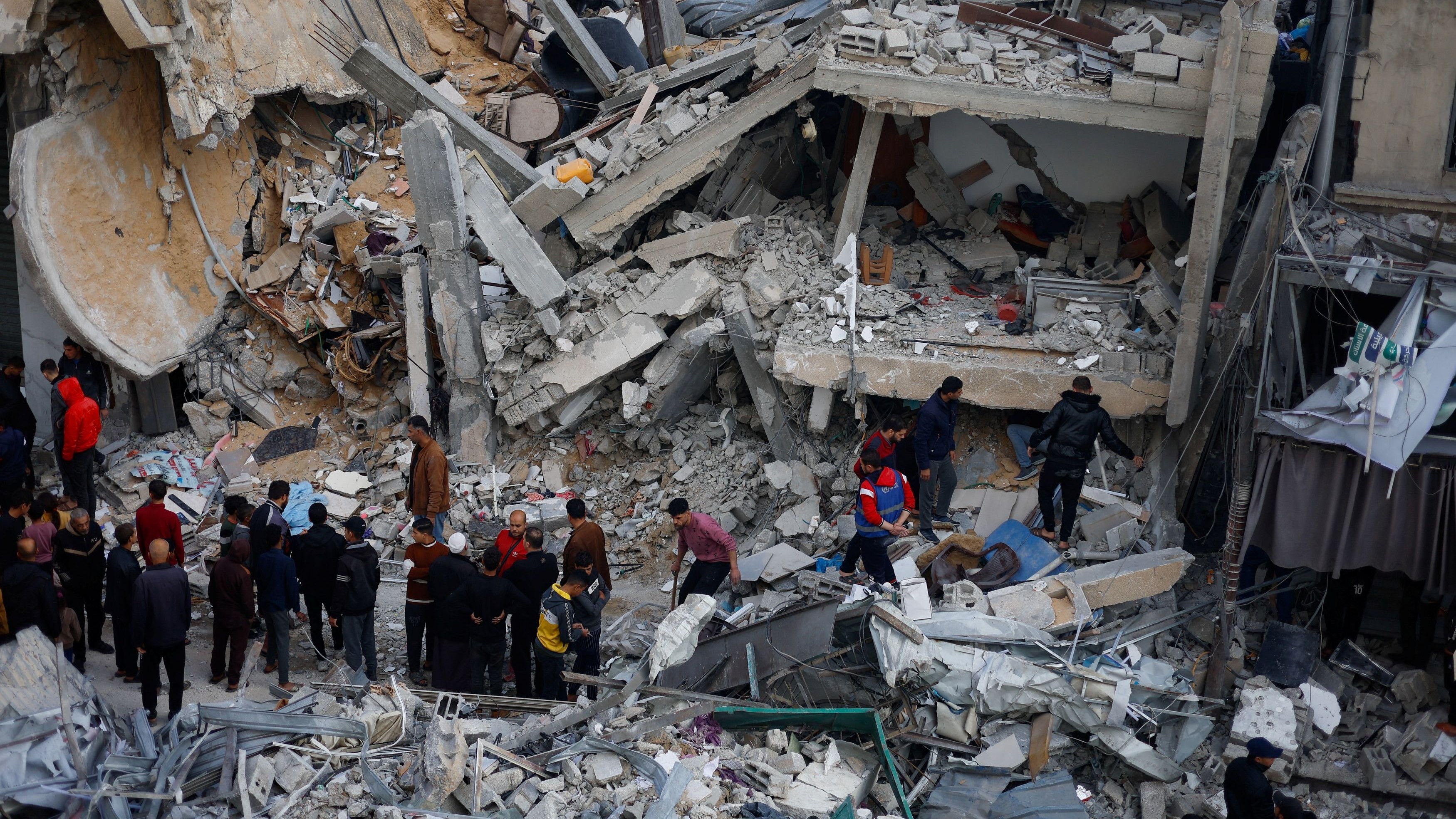 Palestinians gather at the site of an Israeli strike, amid the ongoing conflict between Israel and Hamas, in Rafah, in the southern Gaza Strip March 4, 2024.