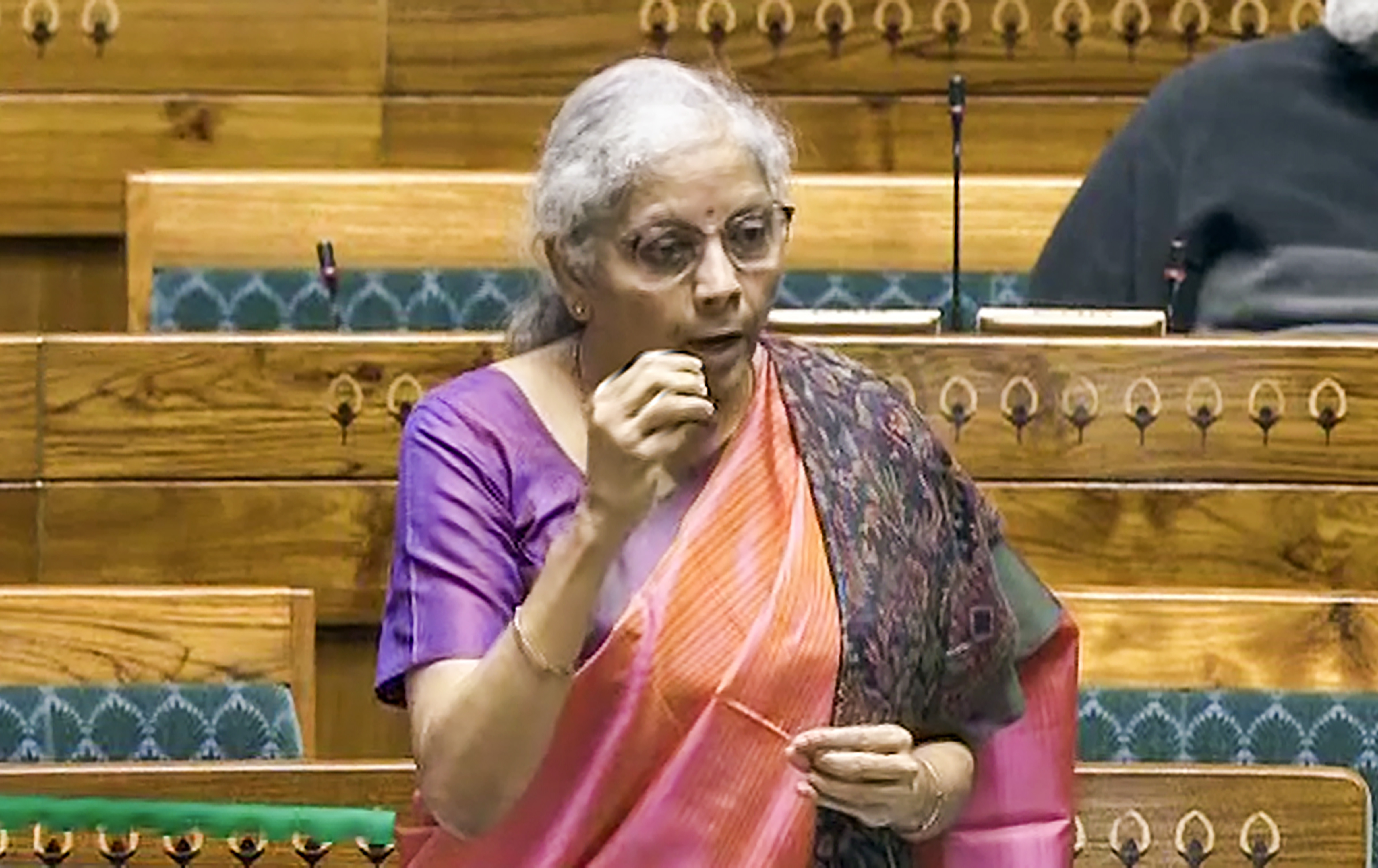**EDS: VIDEO GRAB VIA SANSAD TV** New Delhi: Union Finance Minister Nirmala Sitharaman speaks in the Lok Sabha during the Budget session of Parliament in New Delhi Monday Feb. 5 2024. (PTI Photo)(PTI02_05_2024_000135A)