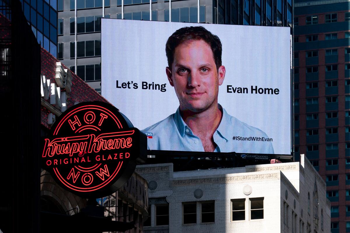 One year since Evan Gershkovich's arrest, a billboard in Times Square, calls for the release of the Wall Street Journal reporter held in Russia.