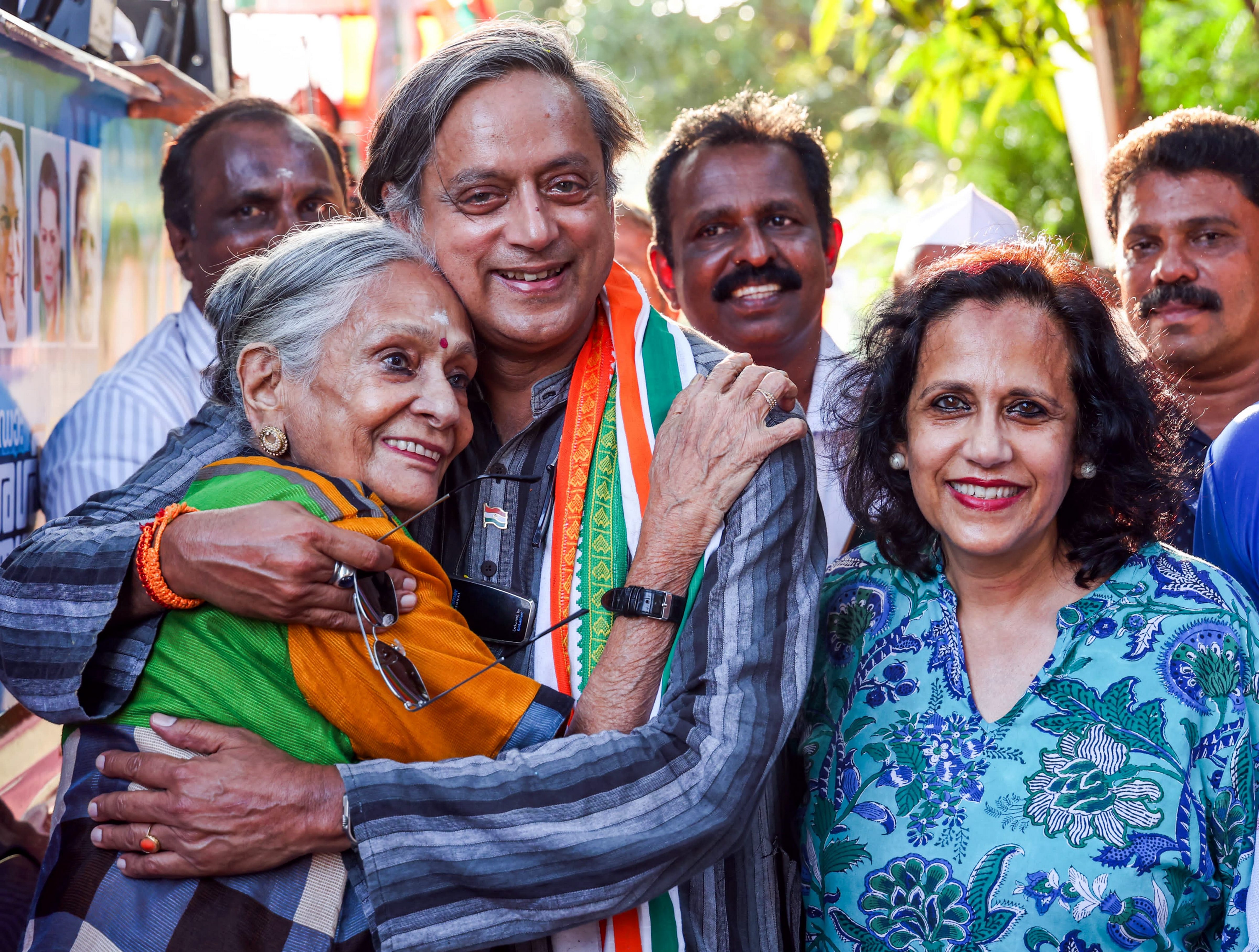 Congress candidate Shashi Tharoor with his mother Sulekha Menon and sister Sobha Tharoor during his election campaign at Kovalam, in Thiruvananthapuram, on Sunday.