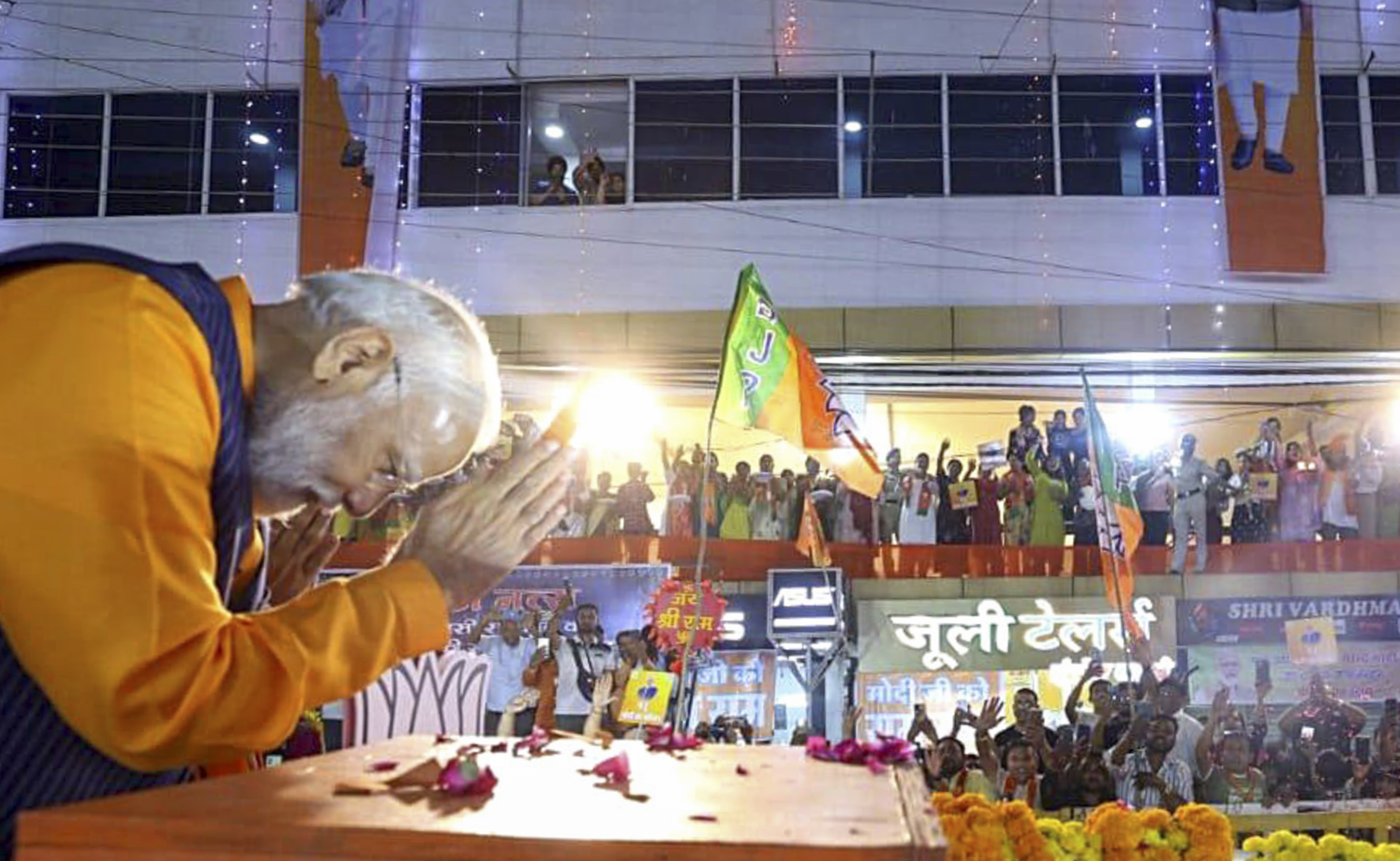 rime Minister Narendra Modi during a road show ahead of Lok Sabha elections, in Jabalpur, on Sunday.