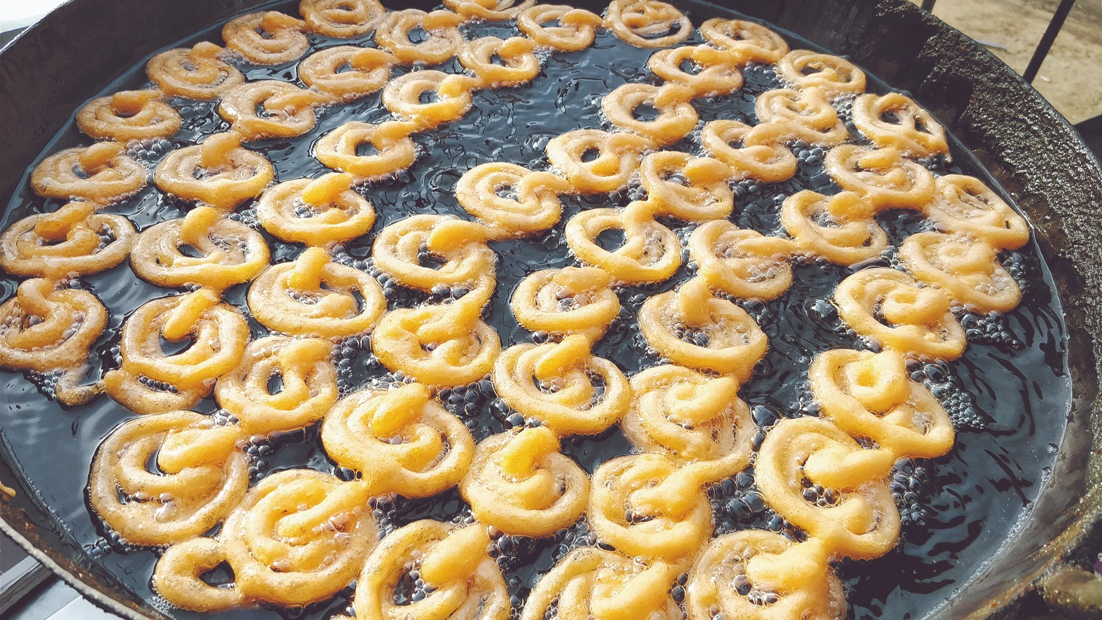 Jalebi: Deep-fried spiral-shaped sweets soaked in sugar syrup, is considered to be lord Hanuman's favourite too.