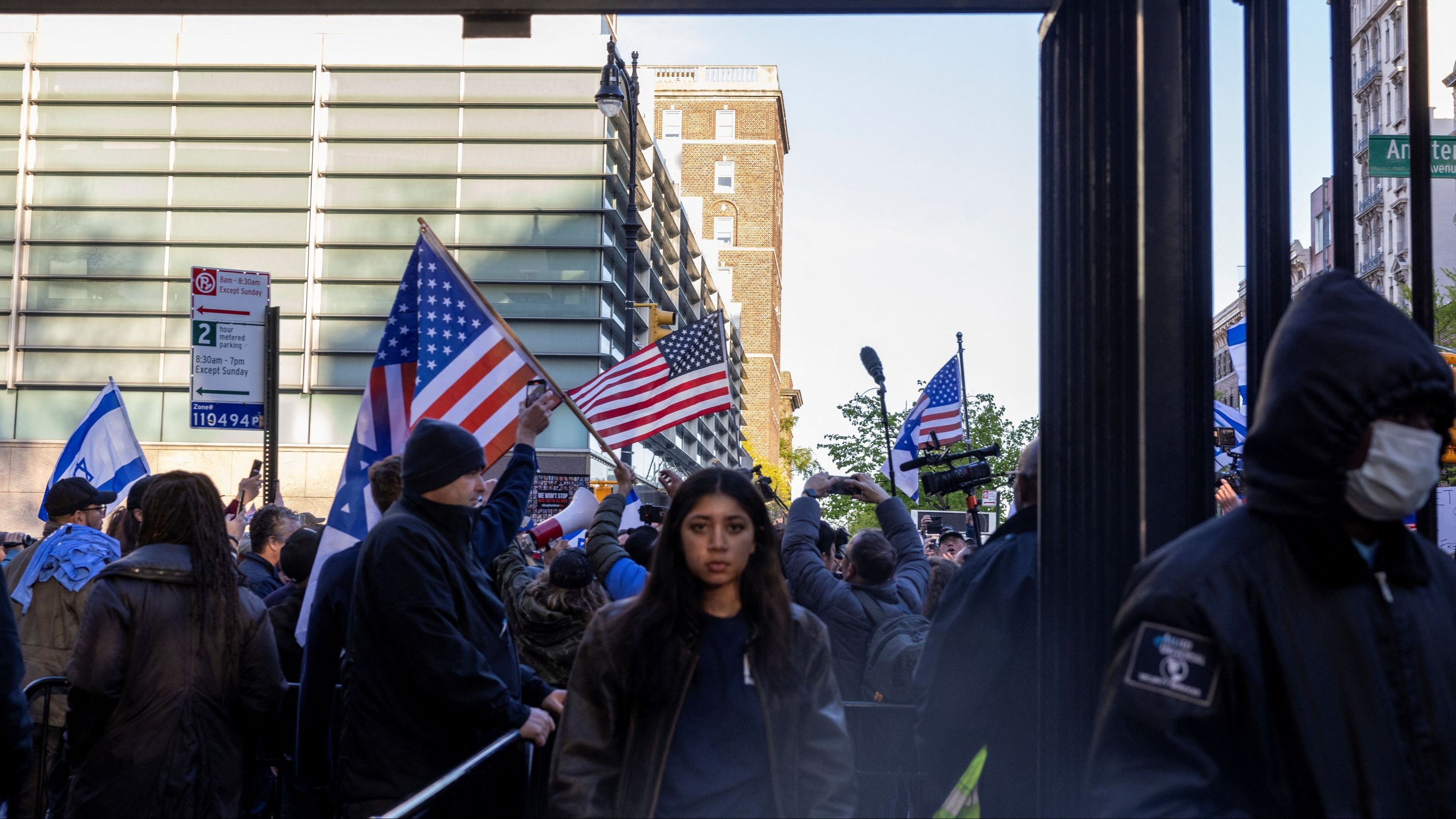 A person reacts near the entrance of Columbia University amidst a demonstration in support of Israel, as the on-campus student protest encampment in support of Palestinians continues, during the ongoing conflict between Israel and the Palestinian Islamist group Hamas, in New York City, U.S., April 25, 2024. 